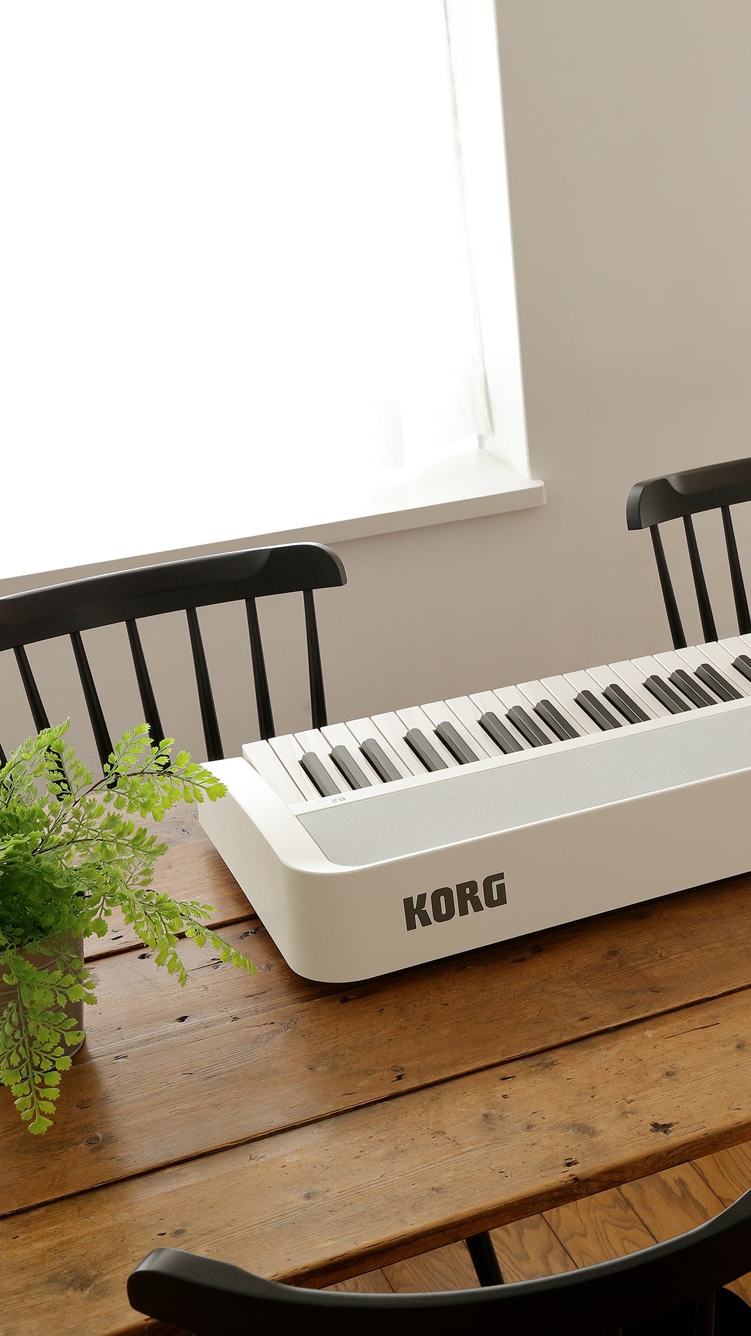 KORG B2 digital piano on table