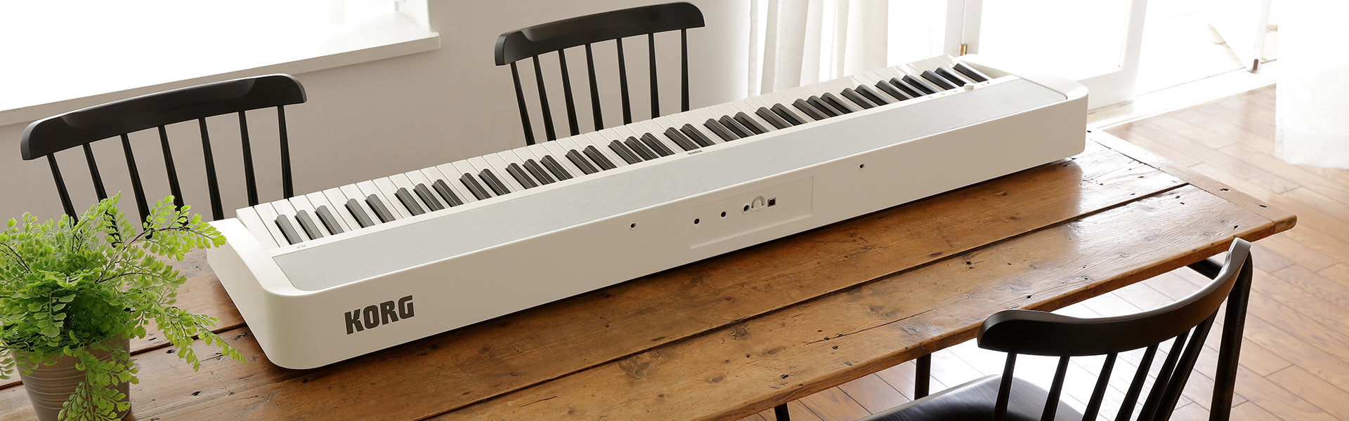 KORG B2 digital piano on table